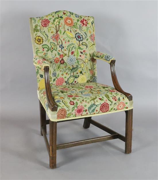 A George III mahogany Gainsborough chair, W.1ft 11in. H.3ft 2in.
